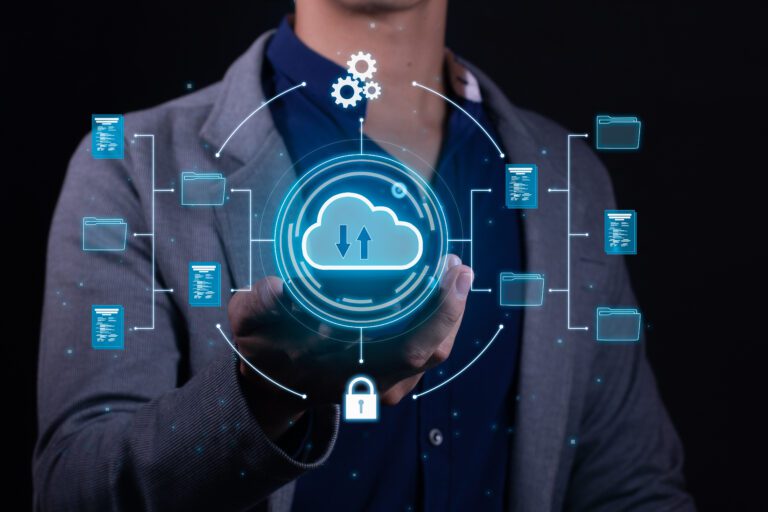 A person in a suit holds a holographic cloud computing symbol, surrounded by digital icons representing data exchange, storage, and cloud management solutions.