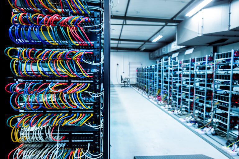 Bitcoin and crypto mining farm. Big data center. High tech server computers at work
