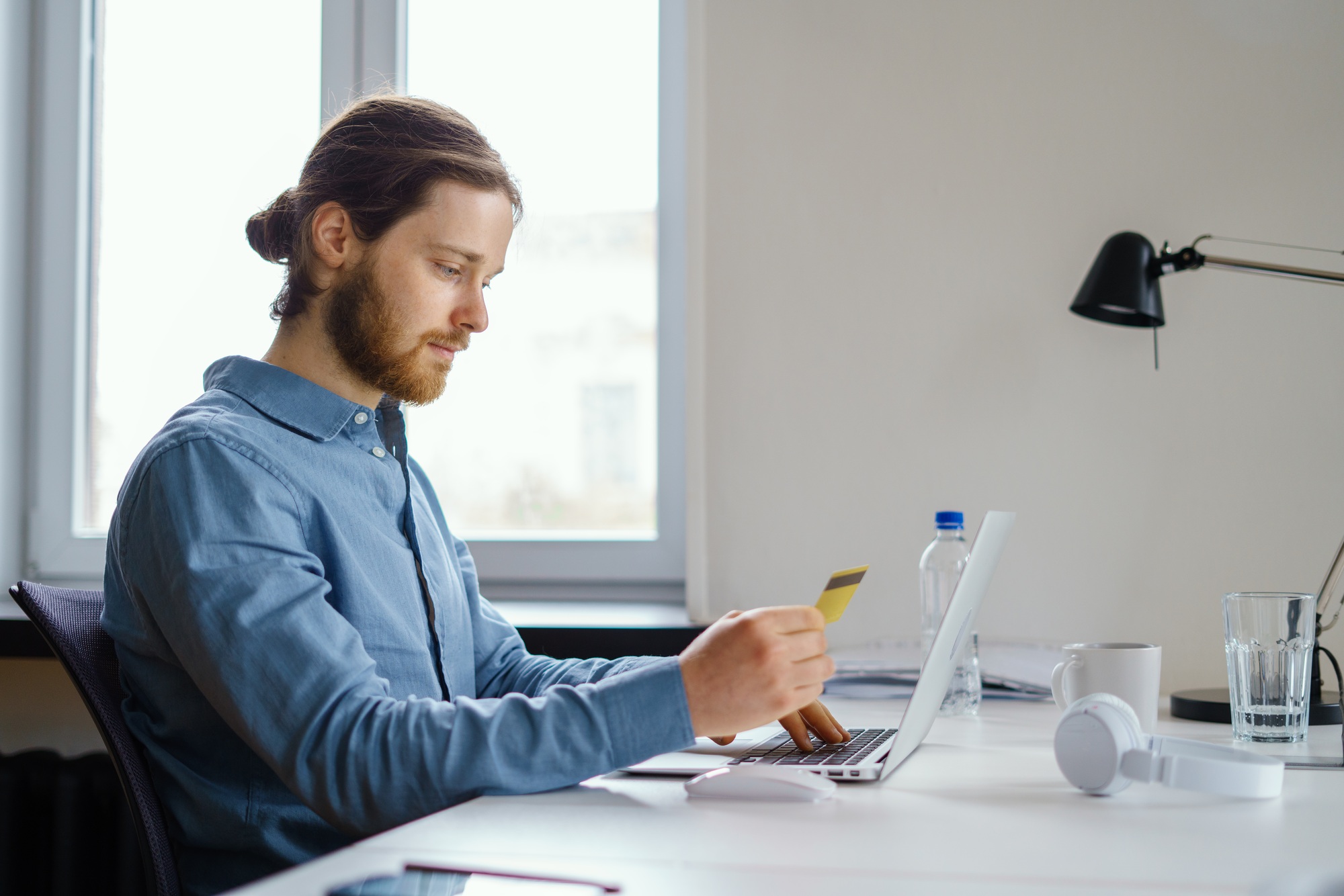 Employee data privacy at work. Booking and purchasing with credit card online at workspace