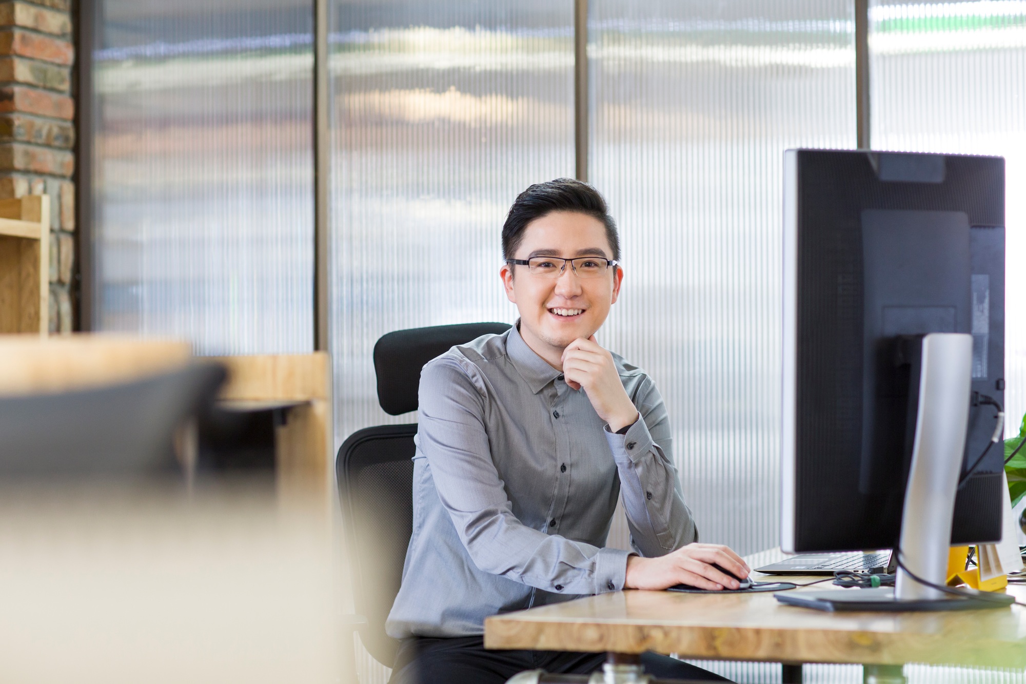 IT worker sitting in office