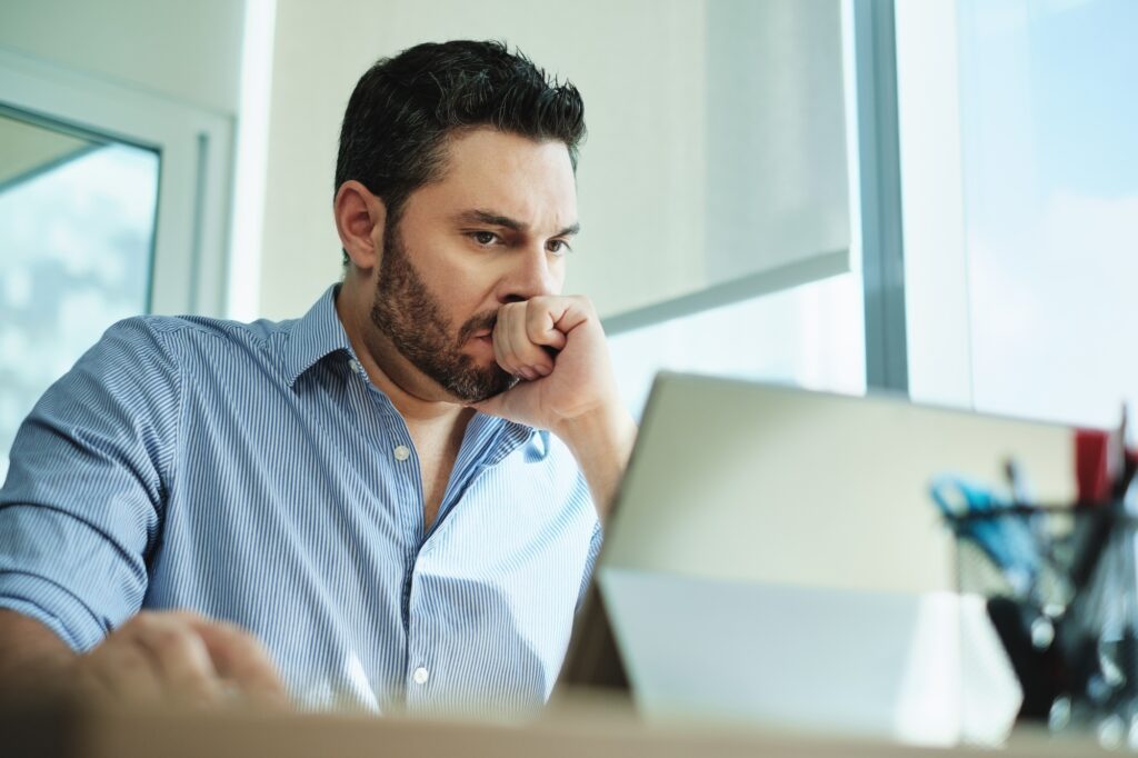 Worried Businessman Got Virus and Data Loss on Laptop Computer