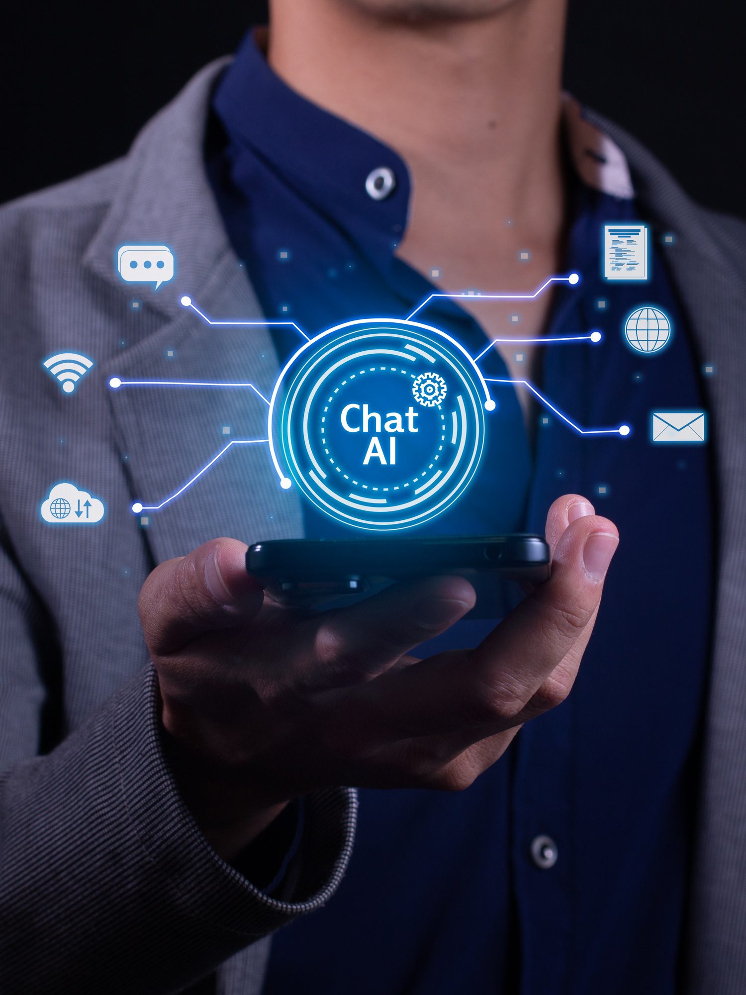 Vertical Photo of A man chats with an artificial intelligence from his smartphone.