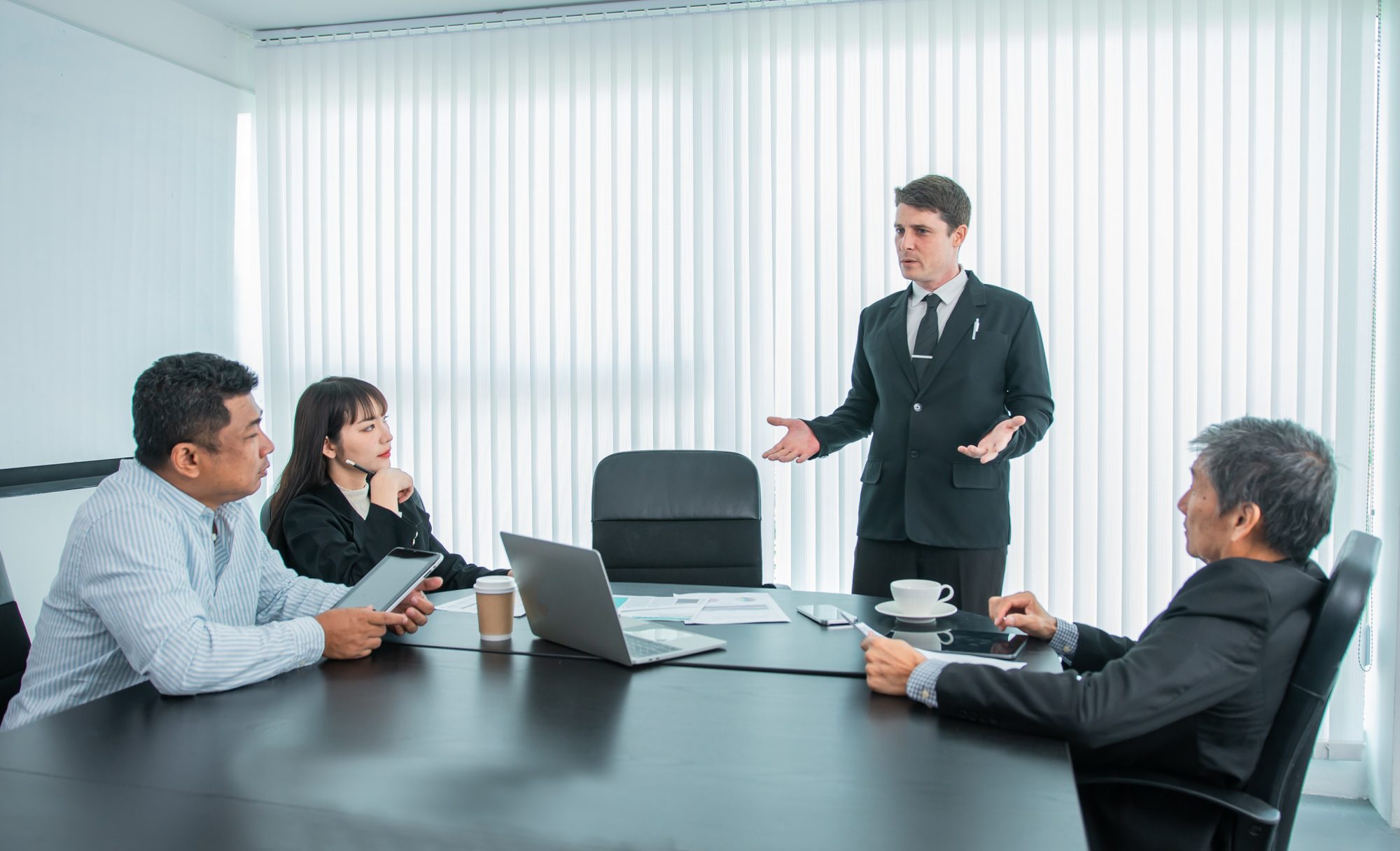 Business people team work while working in board room,